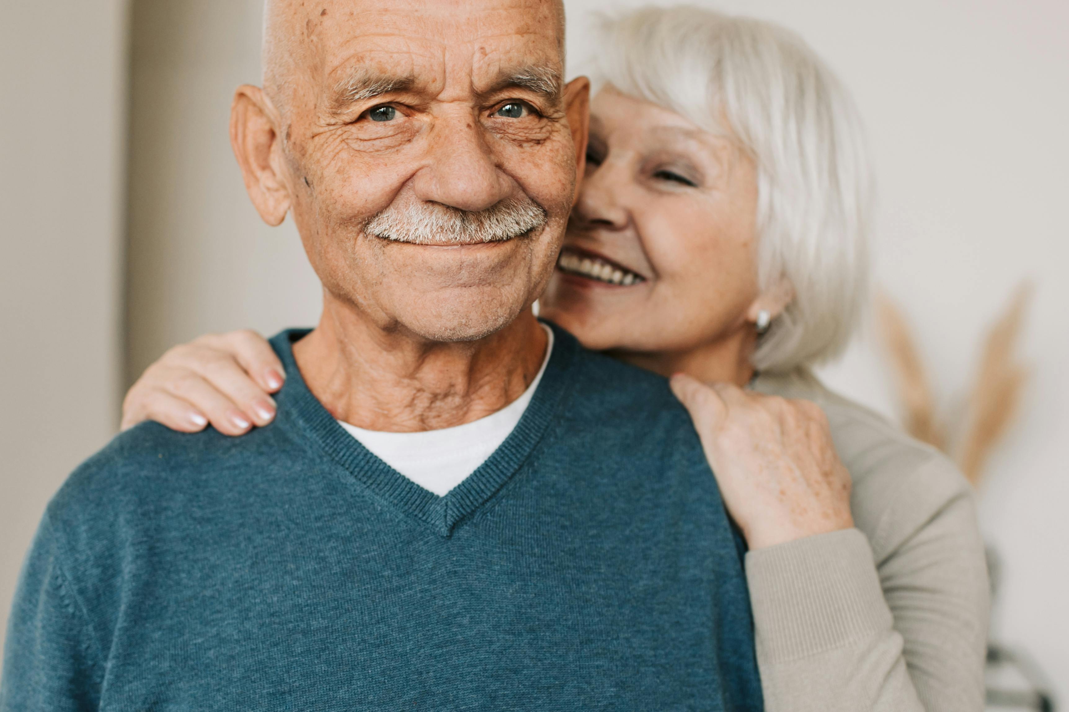 Happy senior couple smiling together