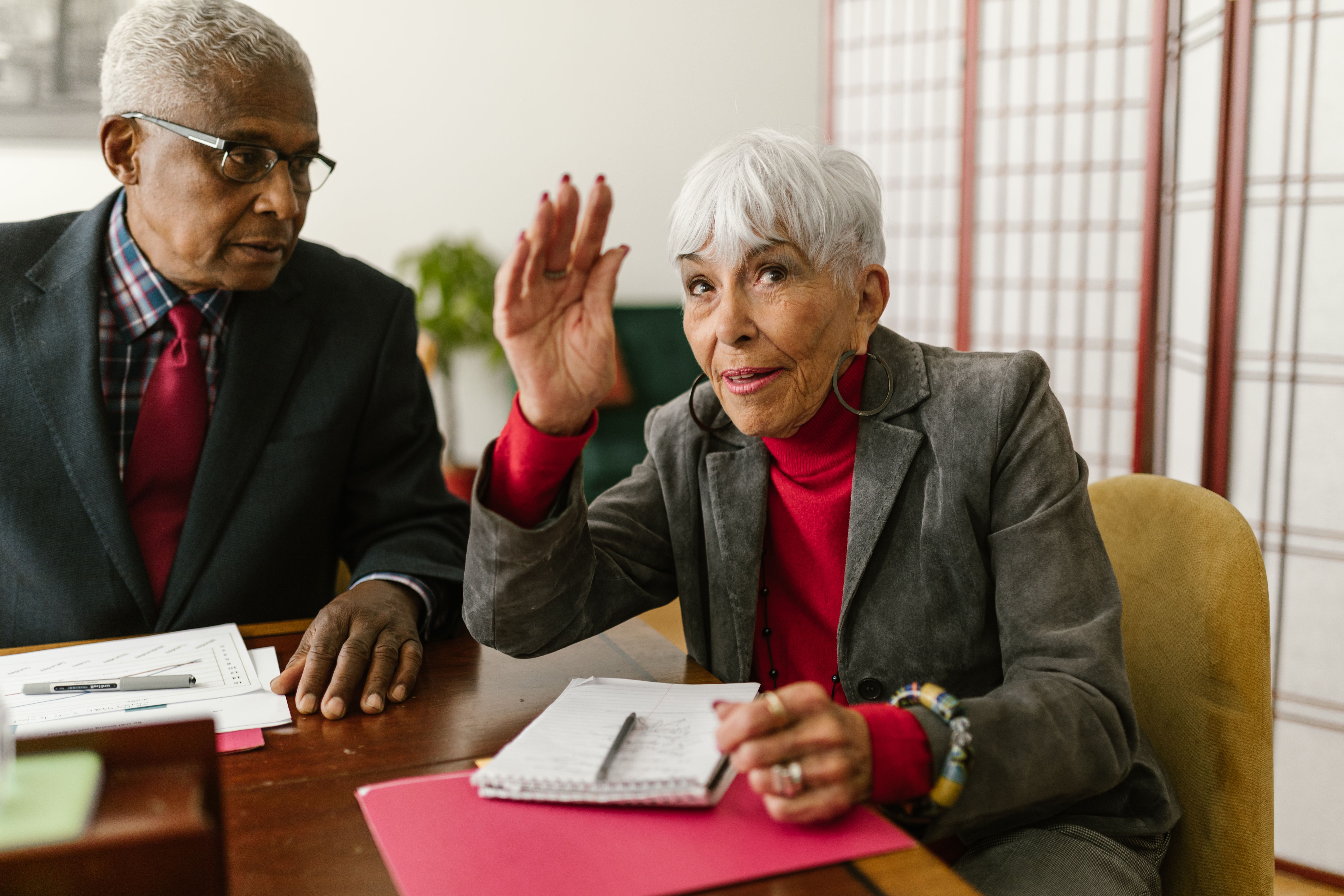 Senior woman asking questions about Medicaid